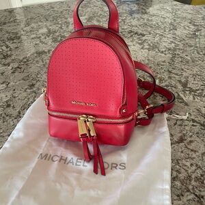 Michael Kors mini backpack.